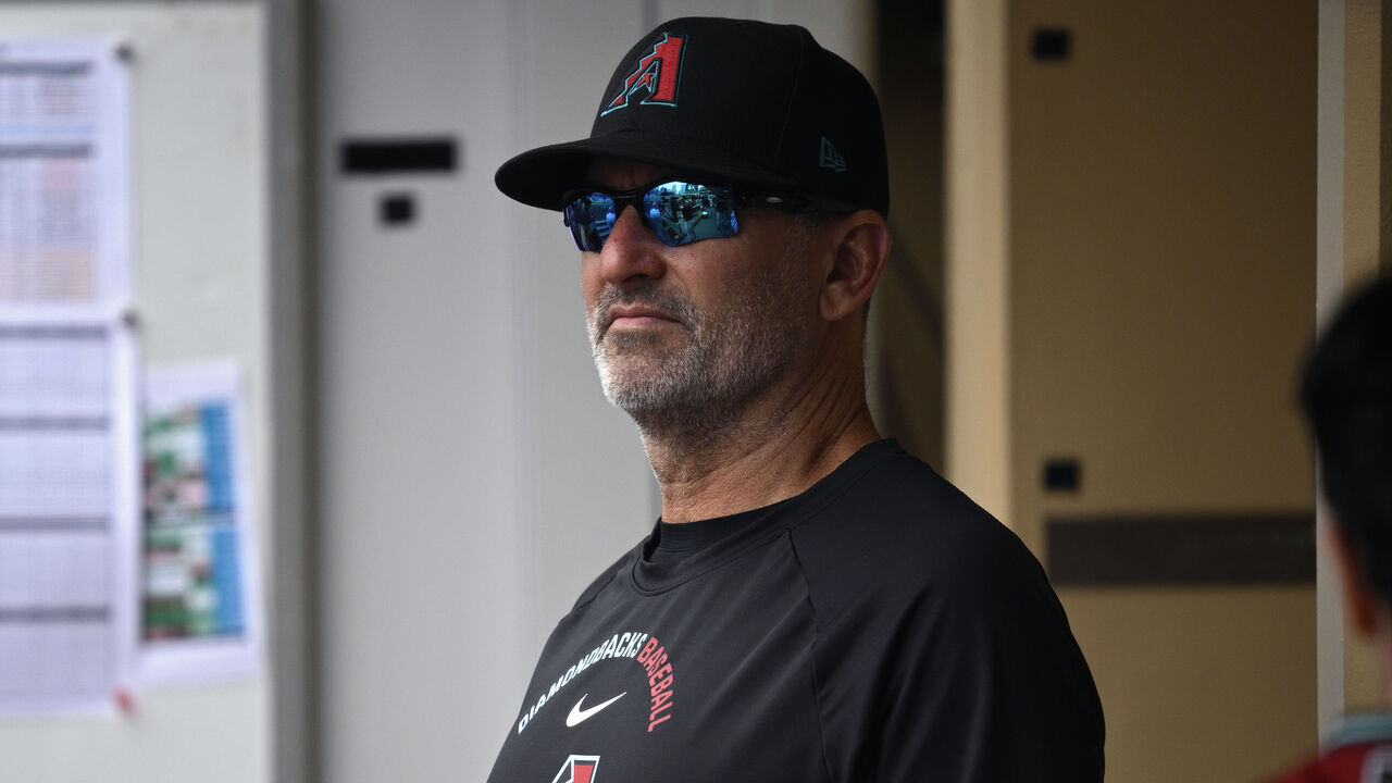 SAN DIEGO, CALIFORNIA - SEPTEMBER 27: Manager Torey Lovullo #17 of the Arizona Diamondbacks looks on from the dugout during the first inning against the San Diego Padres at Petco Park on September 27, 2026 in San Diego, California.