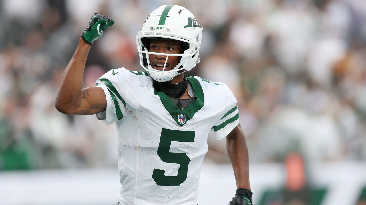 EAST RUTHERFORD, NEW JERSEY - SEPTEMBER 20: Garrett Wilson #5 of the New York Jets celebrates after scoring a touchdown against the Green Bay Packers during the third quarter of the game at MetLife Stadium on September 20, 2026 in East Rutherford, New Jersey.