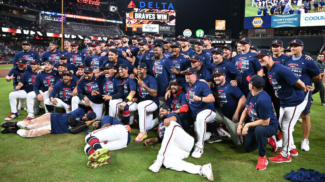 ATLANTA, GEORGIA - OCTOBER 01: The Atlanta Braves pose for a photo after defeating the Philadelphia Phillies in game three of the National League Wild Card Series at Truist Park on October 01, 2026 in Atlanta, Georgia.