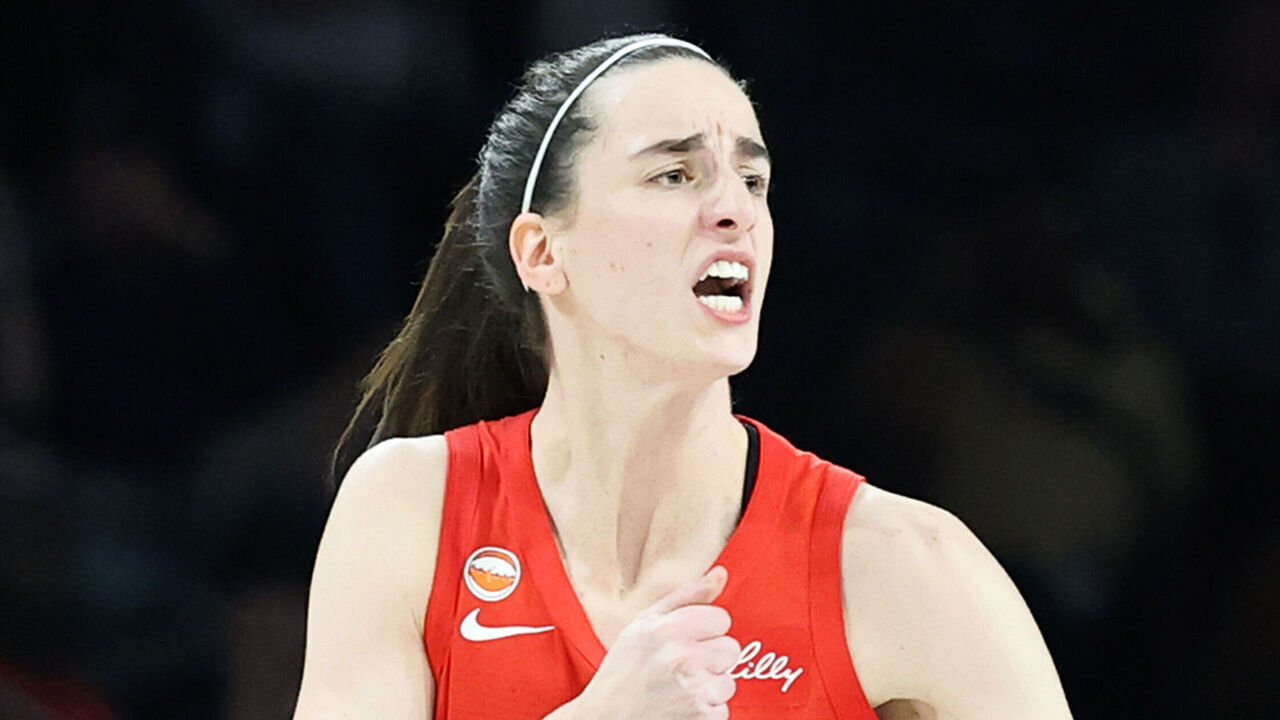 LAS VEGAS, NEVADA - OCTOBER 01: Caitlin Clark #22 of the Indiana Fever reacts after hitting a 3-pointer against the Las Vegas Aces in the first quarter of Game Three of the 2026 WNBA Playoffs first round at Michelob ULTRA Arena on October 01, 2026 in Las Vegas, Nevada.