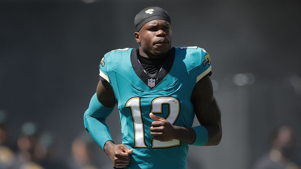 JACKSONVILLE, FL - SEPTEMBER 27: Travis Hunter #12 of the Jacksonville Jaguars runs out on the field before the game between the Jacksonville Jaguars and the New England Patriots on September 27, 2026 at EverBank Stadium in Jacksonville, Fl.