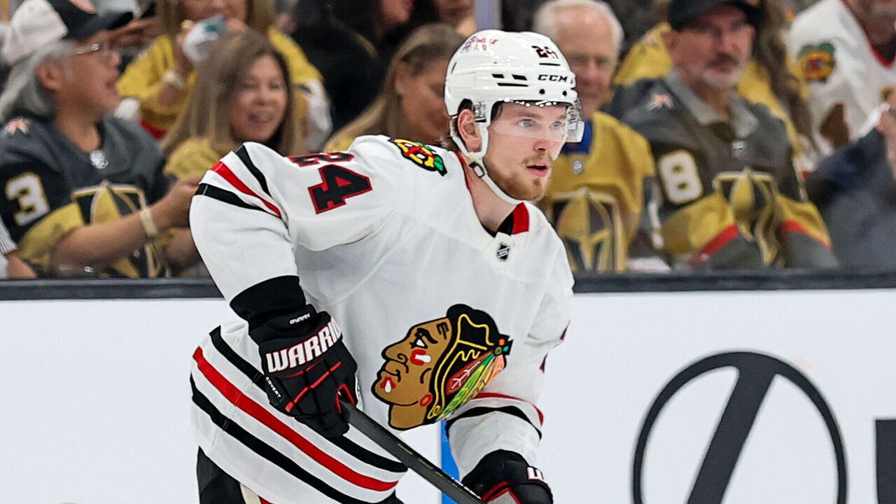 LAS VEGAS, NEVADA - SEPTEMBER 29: Bowen Byram #24 of the Chicago Blackhawks skates with the puck against the Vegas Golden Knights in the second period of their game at T-Mobile Arena on September 29, 2026 in Las Vegas, Nevada. The Golden Knights defeated the Blackhawks 5-2.