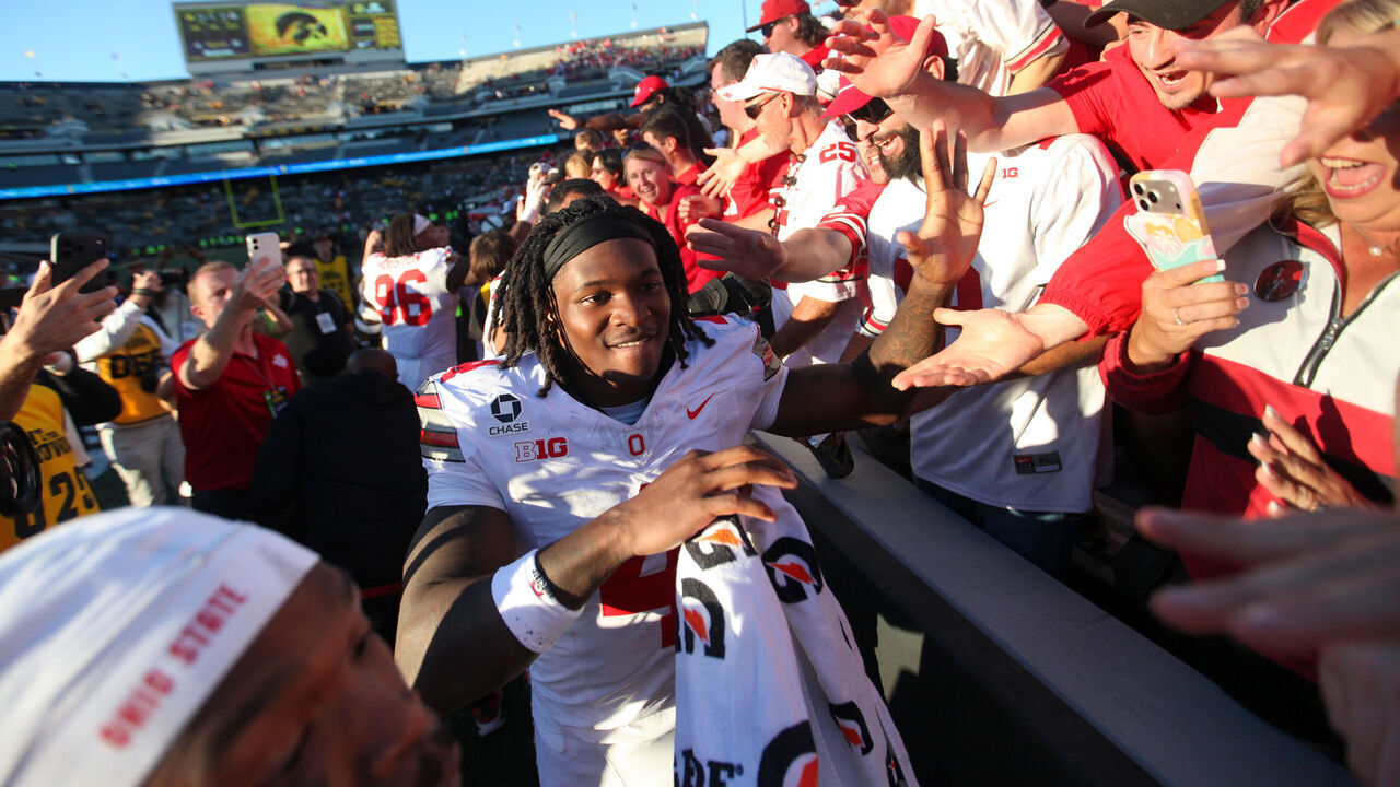 IOWA CITY, IA - OCTOBER 3: Wide receiver Jeremiah Smith #4 of the Ohio State Buckeyes interacts with fans after the match-up against the Iowa Hawkeyes at Kinnick Stadium on October 3, 2026 in Iowa City, Iowa.