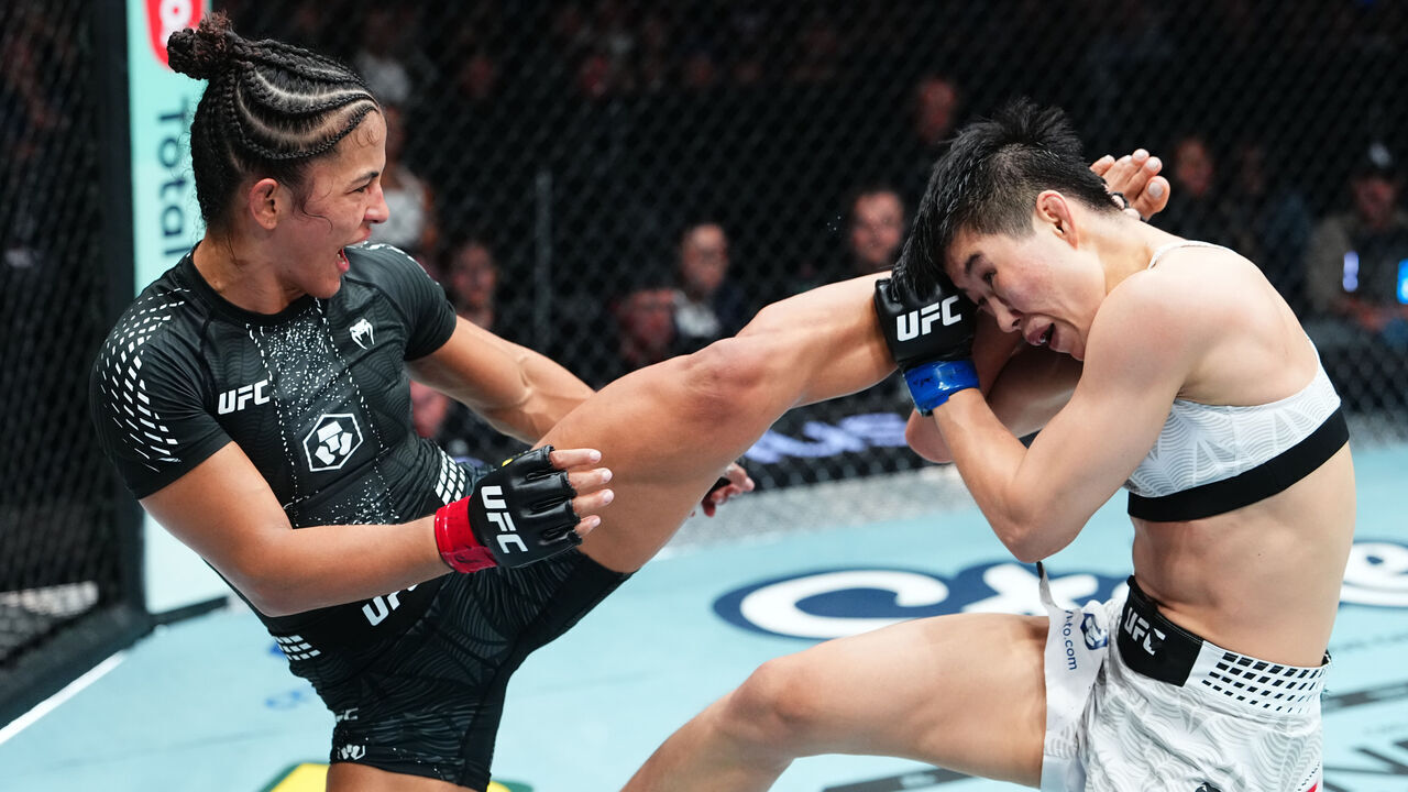 SALT LAKE CITY, UTAH - OCTOBER 03: Natalia Silva of Brazil kicks Wang Cong of China in the UFC flyweight championship fight during the UFC 332 event at Delta Center on October 03, 2026 in Salt Lake City, Utah.