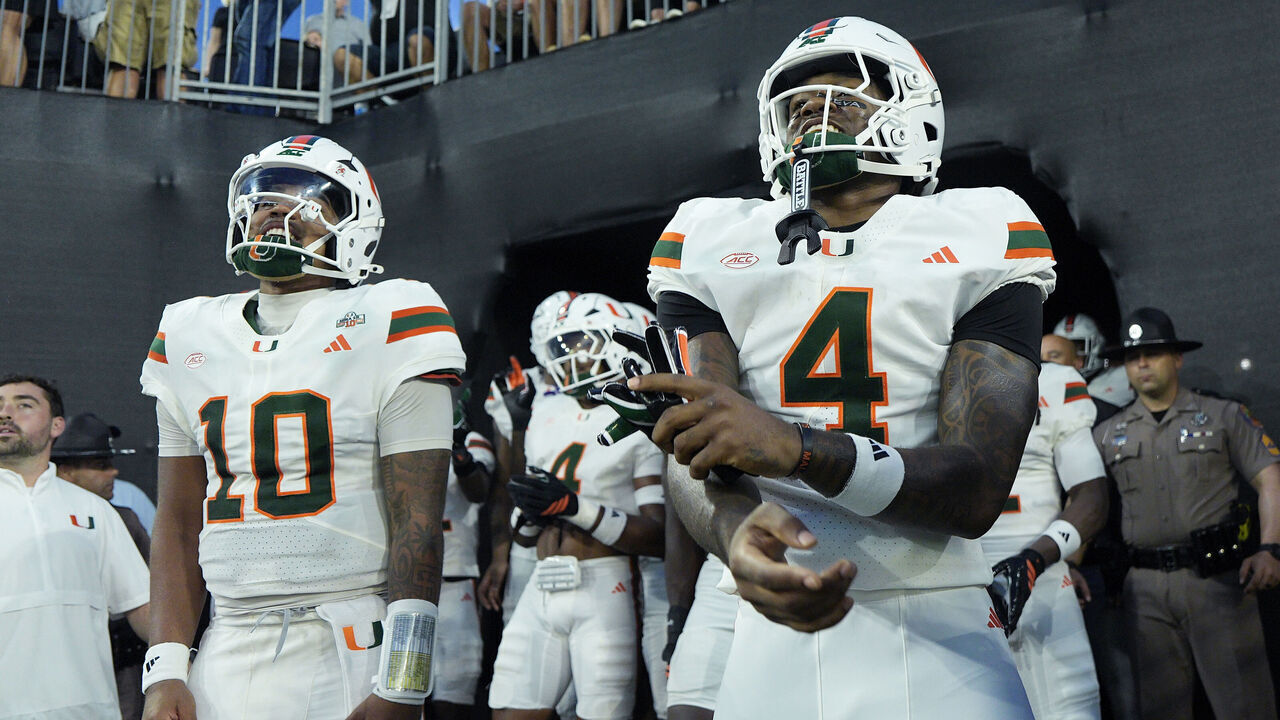 WINSTON-SALEM, NC - SEPTEMBER 18: Darian Mensah (10) and Mark Fletcher Jr. (4) of the Miami Hurricanes prepare to lead the team to the field before the college football game against the Wake Forest Demon Deacons on September 18, 2026 at Allegacy Stadium in Winston-Salem, North Carolina.