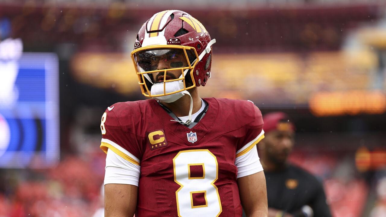 LANDOVER, MARYLAND - SEPTEMBER 27: Marcus Mariota #8 of the Washington Commanders warms up prior to an NFL football game against the Seattle Seahawks at Northwest Stadium on September 27, 2026 in Landover, Maryland.