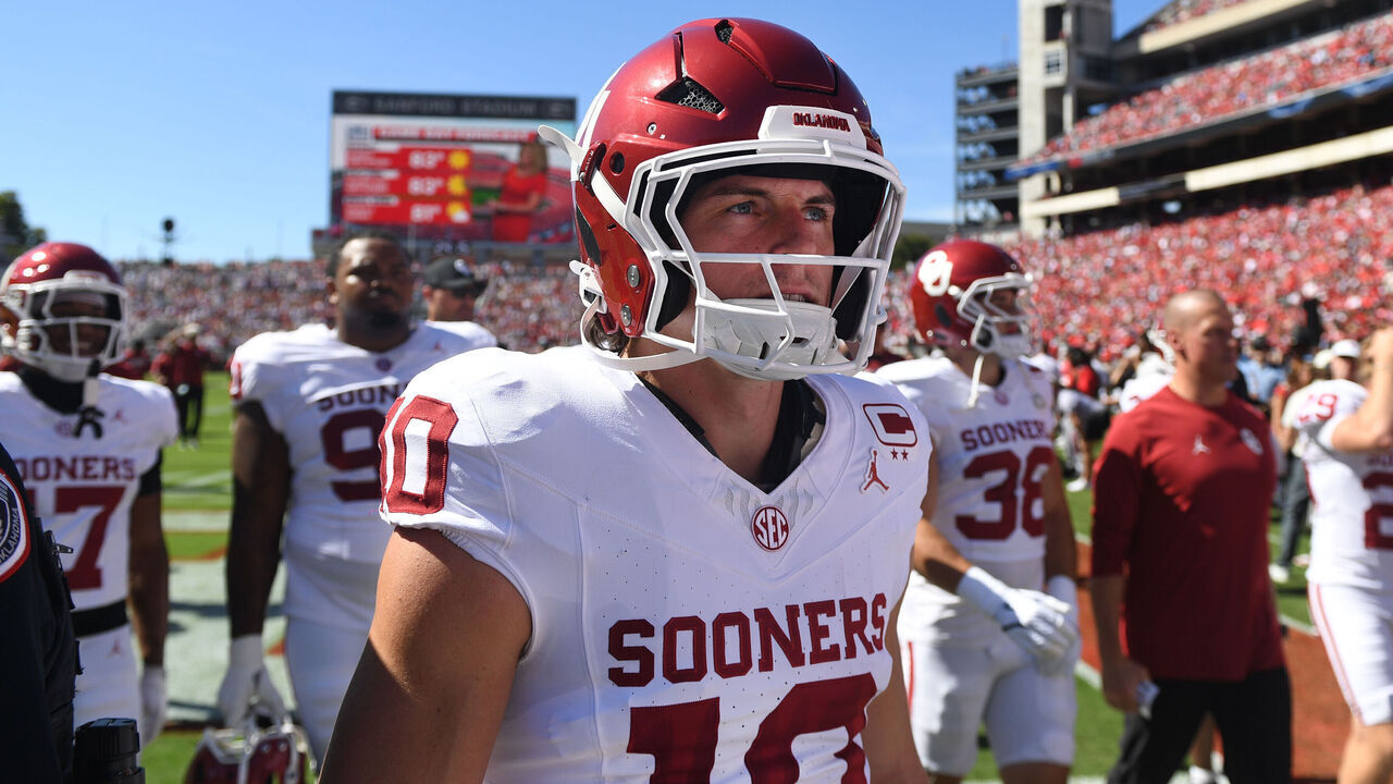 ATHENS, GA - SEPTEMBER 26: Quarterback John Mateer #10 of the Oklahoma Sooners walks off the field prior to the college football game between the Oklahoma Sooners and the Georgia Bulldogs on September 26, 2026, at Sanford Stadium in Athens, GA.