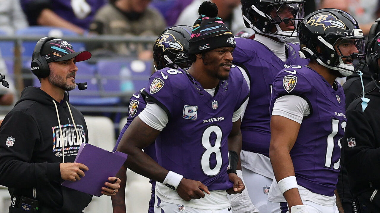 BALTIMORE, MARYLAND - OCTOBER 04: Lamar Jackson #8 of the Baltimore Ravens looks on from the sideline during the third quarter of the game against the Tennessee Titans at M&T Bank Stadium on October 04, 2026 in Baltimore, Maryland.