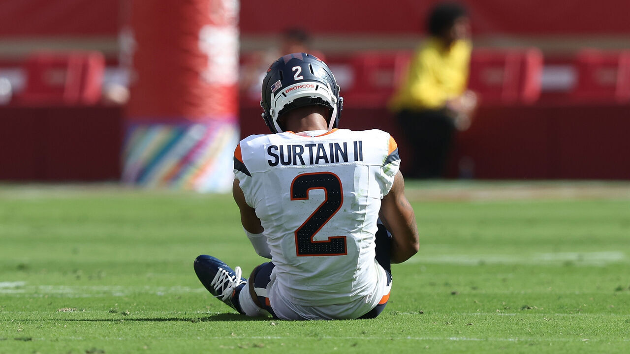 SANTA CLARA, CALIFORNIA - OCTOBER 04: Pat Surtain II #2 of the Denver Broncos sits on the field being assisted in the second quarter against the San Francisco 49ers at Levi's Stadium on October 04, 2026 in Santa Clara, California.