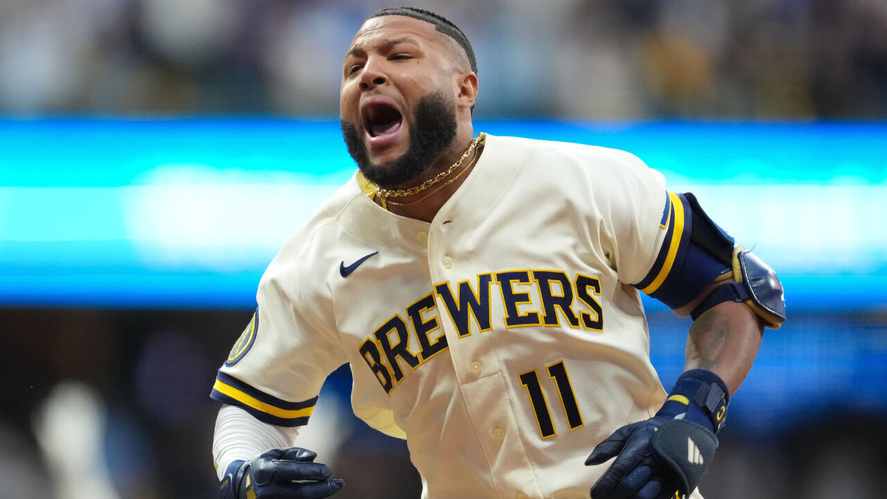 MILWAUKEE, WISCONSIN - OCTOBER 04: Jackson Chourio #11 of the Milwaukee Brewers celebrates the game-winning two-run single against the San Diego Padres during the ninth inning in game two of the National League Division Series at American Family Field on October 04, 2026 in Milwaukee, Wisconsin.