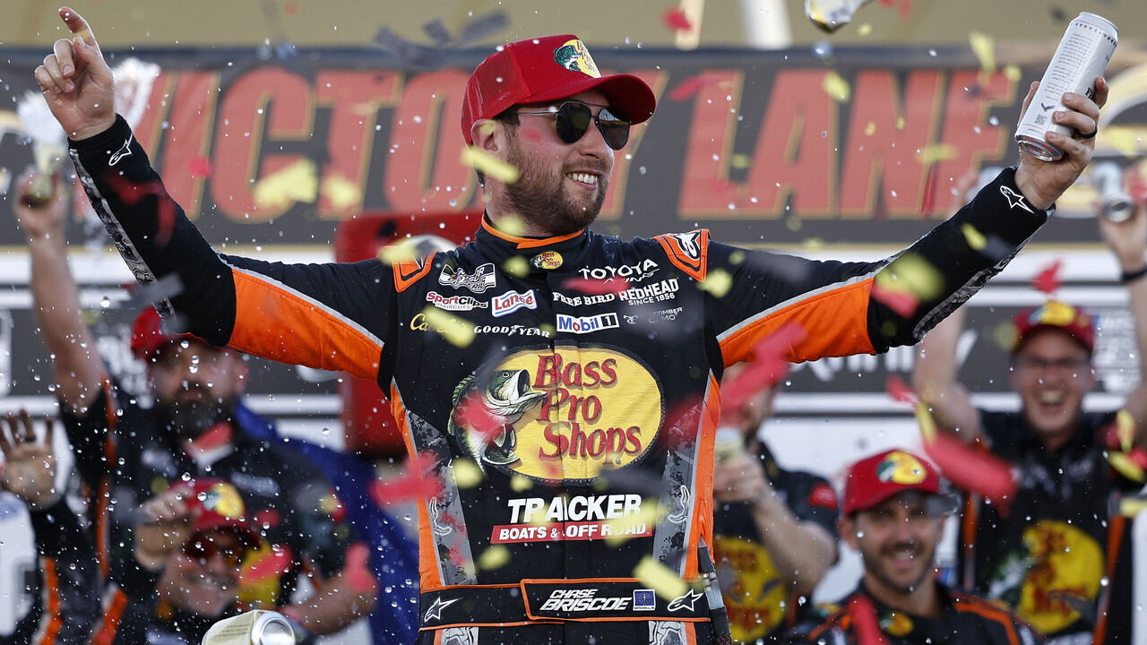 LAS VEGAS, NEVADA - OCTOBER 04: Chase Briscoe, driver of the #19 Bass Pro Shops Toyota, celebrates in victory lane after winning the NASCAR Cup Series South Point 400 at Las Vegas Motor Speedway on October 04, 2026 in Las Vegas, Nevada.