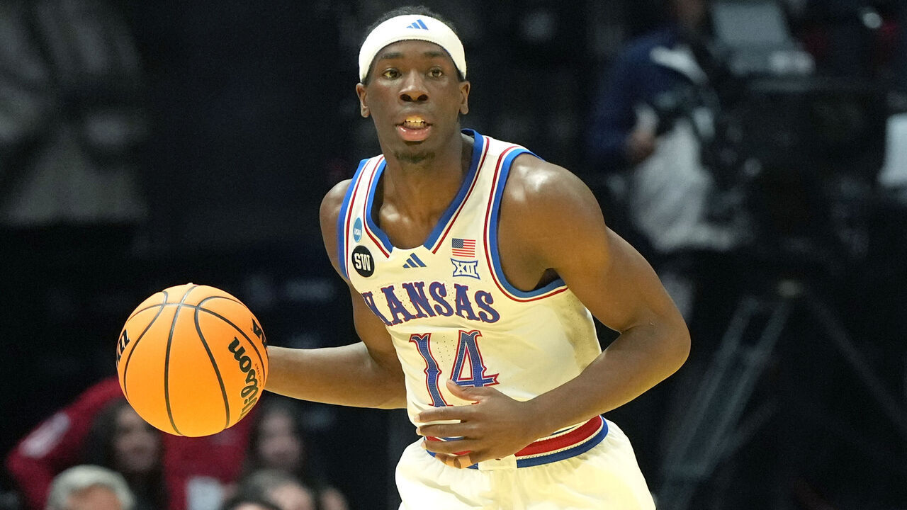 SAN DIEGO, CA - MARCH 20: Melvin Council Jr. #14 of the Kansas Jayhawks dribbles the ball during the first round of the 2026 NCAA Men's Basketball Tournament game against the California Baptist Lancers at Viejas Arena at San Diego State University on March 20, 2026 in San Diego, California.