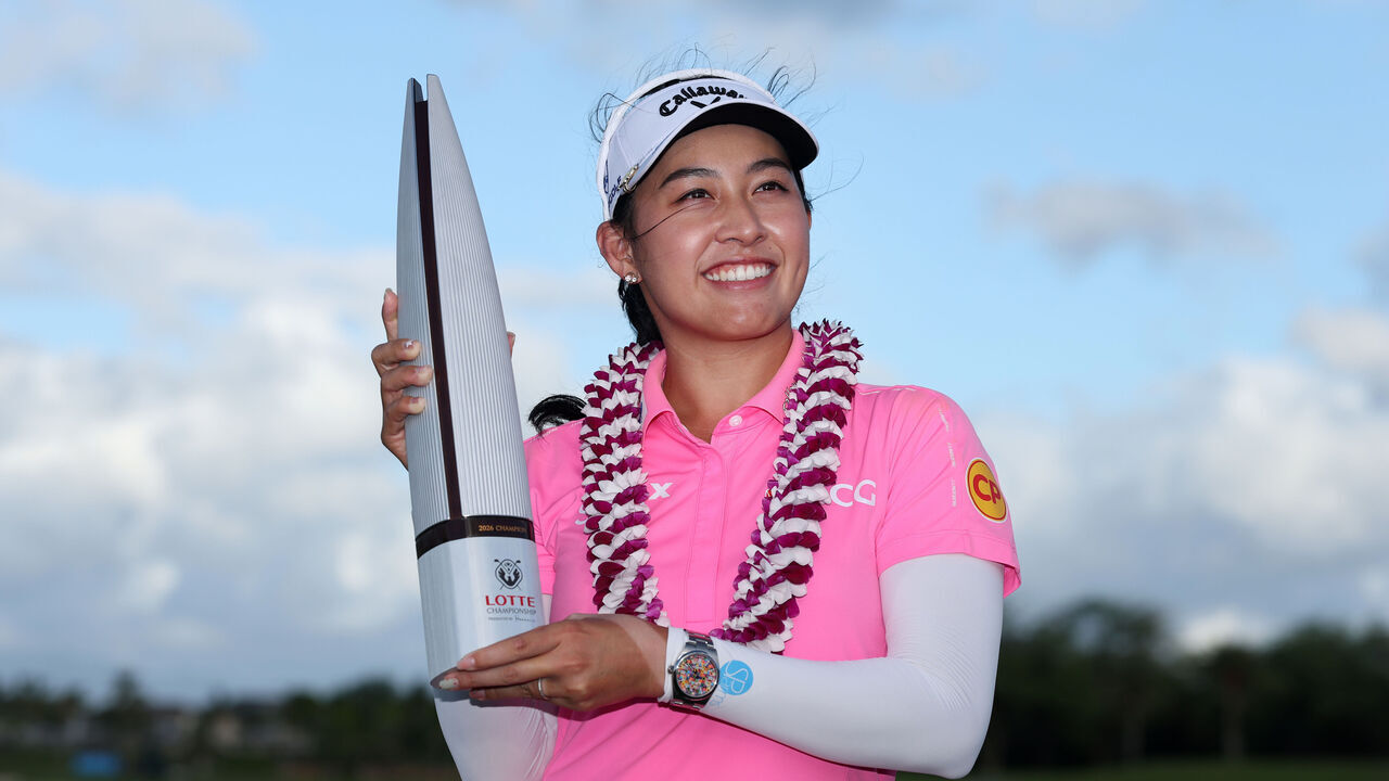 EWA BEACH, HAWAII - OCTOBER 04: Jeeno Thitikul of Thailand poses with the trophy after her winning birdie putt on the 18th green during the final round of the LOTTE Championship presented by Hoakalei 2026 at Hoakalei Country Club on October 04, 2026 in Ewa Beach, Hawaii.