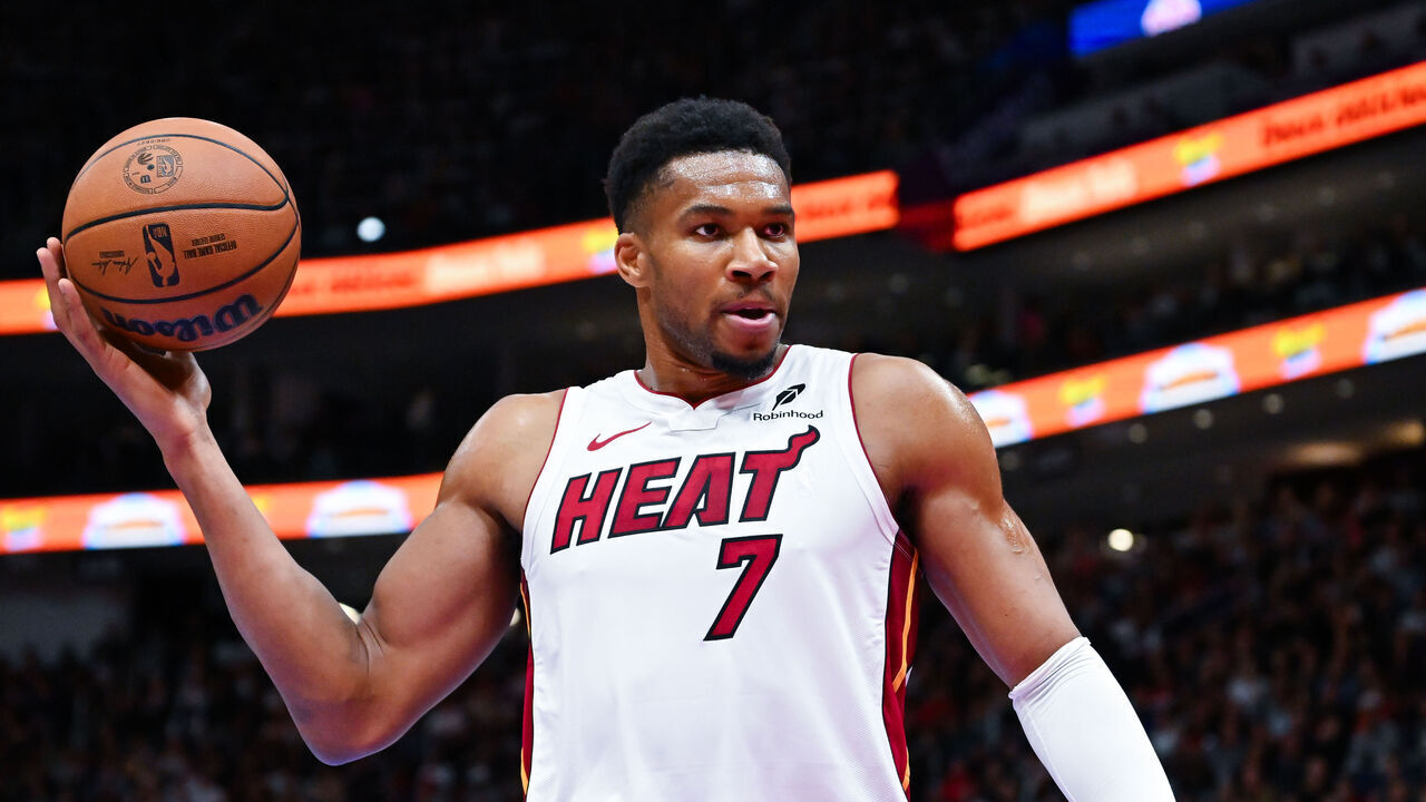 QUEBEC CITY, CANADA - OCTOBER 03: Giannis Antetokounmpo #7 of the Miami Heat holds the ball as he looks on during the first half against the Toronto Raptors in a preseason NBA game at the Videotron Centre on October 3, 2026 in Quebec City, Quebec, Canada.