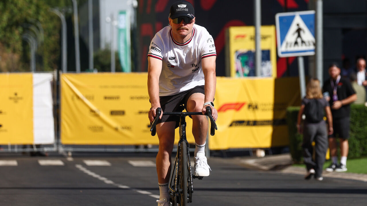 Valtteri Bottas of Cadillac is riding a bicycle ahead Formula 1 Grand Prix of Spain at Madring Circuit in Madrid, Spain, on September 13, 2026.