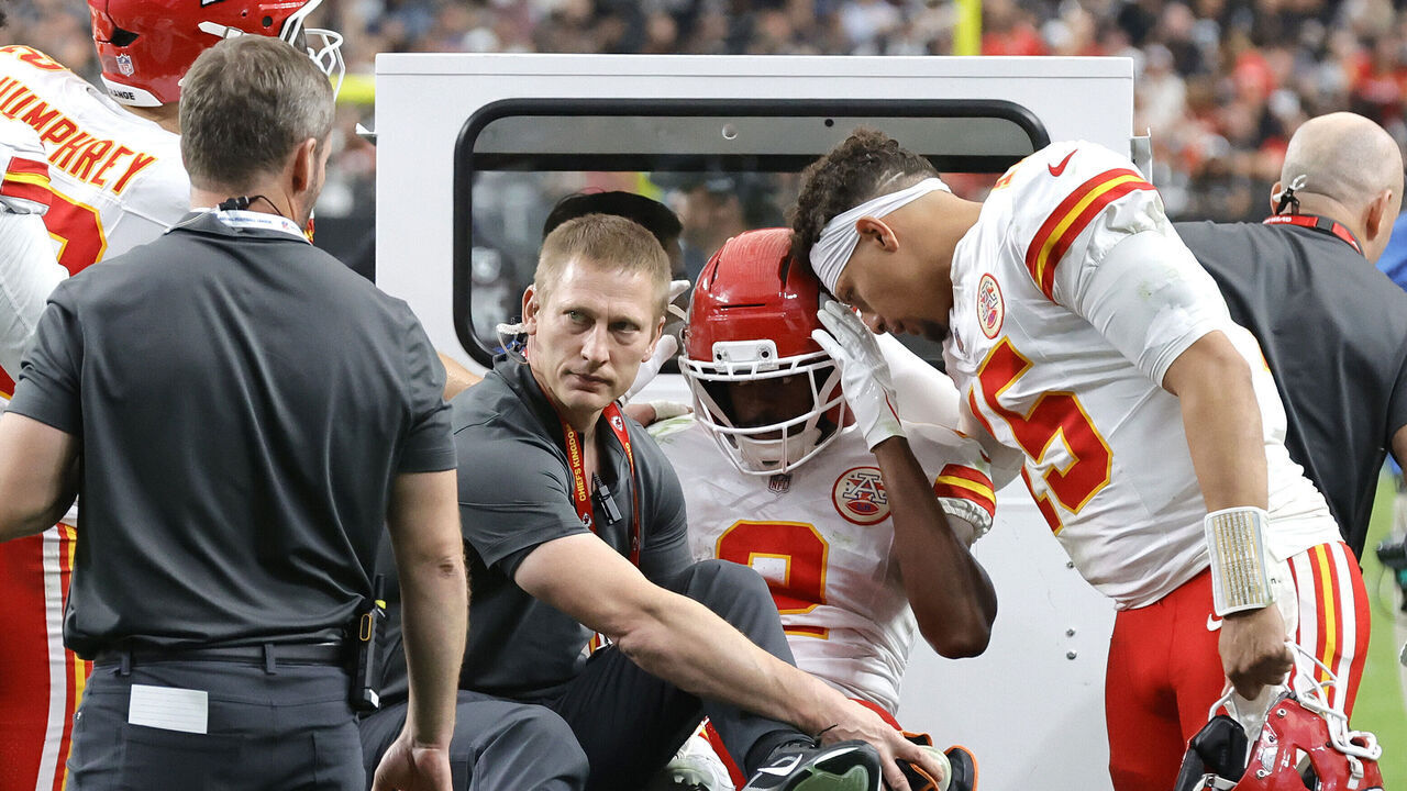 LAS VEGAS, NEVADA - OCTOBER 04: Patrick Mahomes #15 of the Kansas City Chiefs embraces Tyquan Thornton #2 after an injury against the Las Vegas Raiders during the fourth quarter at Allegiant Stadium on October 04, 2026 in Las Vegas, Nevada.