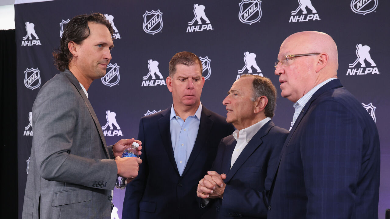 LOS ANGELES, CALIFORNIA - JUNE 27: (l-r) Ron Hainsey and Marty Walsh of the NHLPA along with Gary Bettman and Bill Daly of the NHL announce a tentative CBA agreement at Peacock Theater on June 27, 2025 in Los Angeles, California.