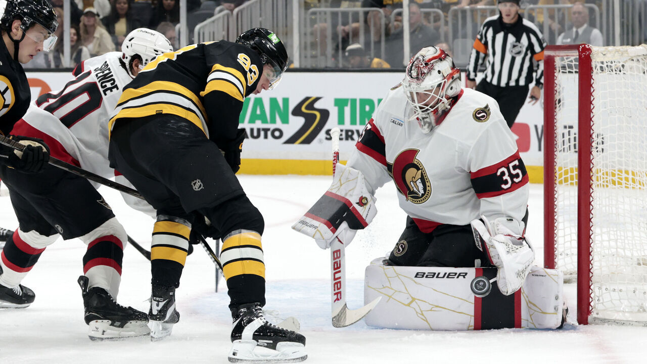 BOSTON, MA - OCTOBER 05: Linus Ullmark #35 of the Ottawa Senators makes a point blank save on Fraser Minten #93 of the Boston Bruins during a game between the Boston Bruins and the Ottawa Senators on October 5, 2026, at TD Garden in Boston, Massachusetts.