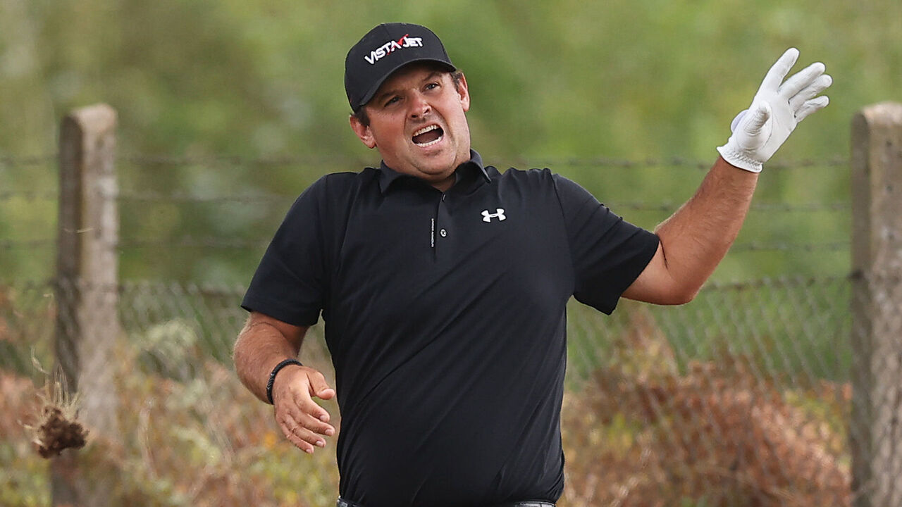 VIRGINIA WATER, ENGLAND - SEPTEMBER 18: Patrick Reed of the United States reacts following his second shot on the ninth hole on day two of the BMW PGA Championship at Wentworth Golf Club on September 18, 2026 in Virginia Water, England.