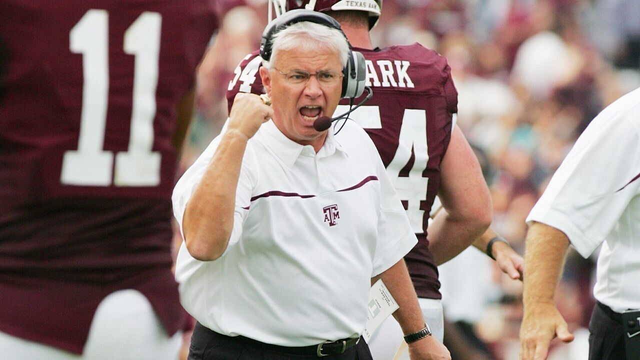 COLLEGE STATION, TX - OCTOBER 14: Head coach Dennis Franchione of the Texas A&M Aggies encourages his players against the Missouri Tigers at Kyle Field on October 14, 2006 in College Station, Texas. Texas A&M won 25-19.