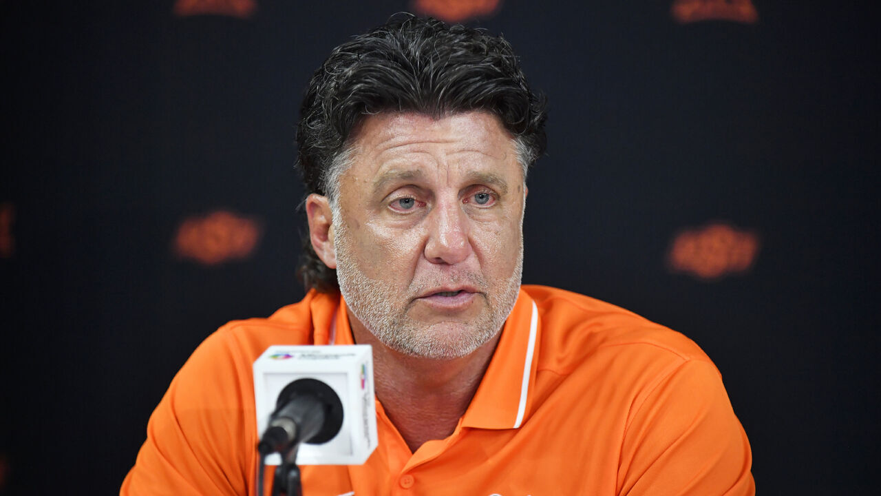 FRISCO, TX - JULY 09: Oklahoma State Cowboys coach Mike Gundy talks to reporters during day two of Big 12 Media Days on Wednesday, July 09, 2025 at the Ford Center at The Star in Frisco, TX.