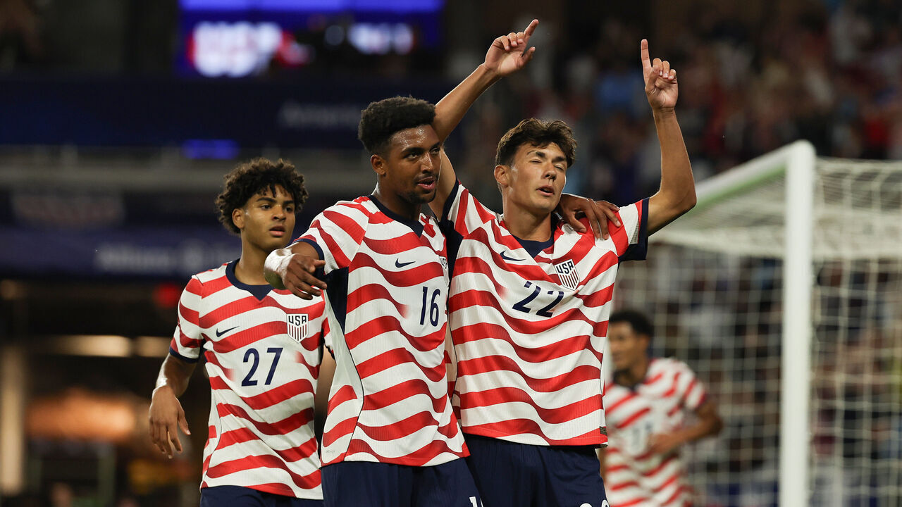 ST PAUL, MINNESOTA - OCTOBER 06: Justin Ellis #22 of United States celebrates scoring his team's first goal with teammates Alex Freeman #16 and Mathis Albert #27 during the international friendly match between United States and Canada at Allianz Field on October 06, 2026 in St Paul, Minnesota.