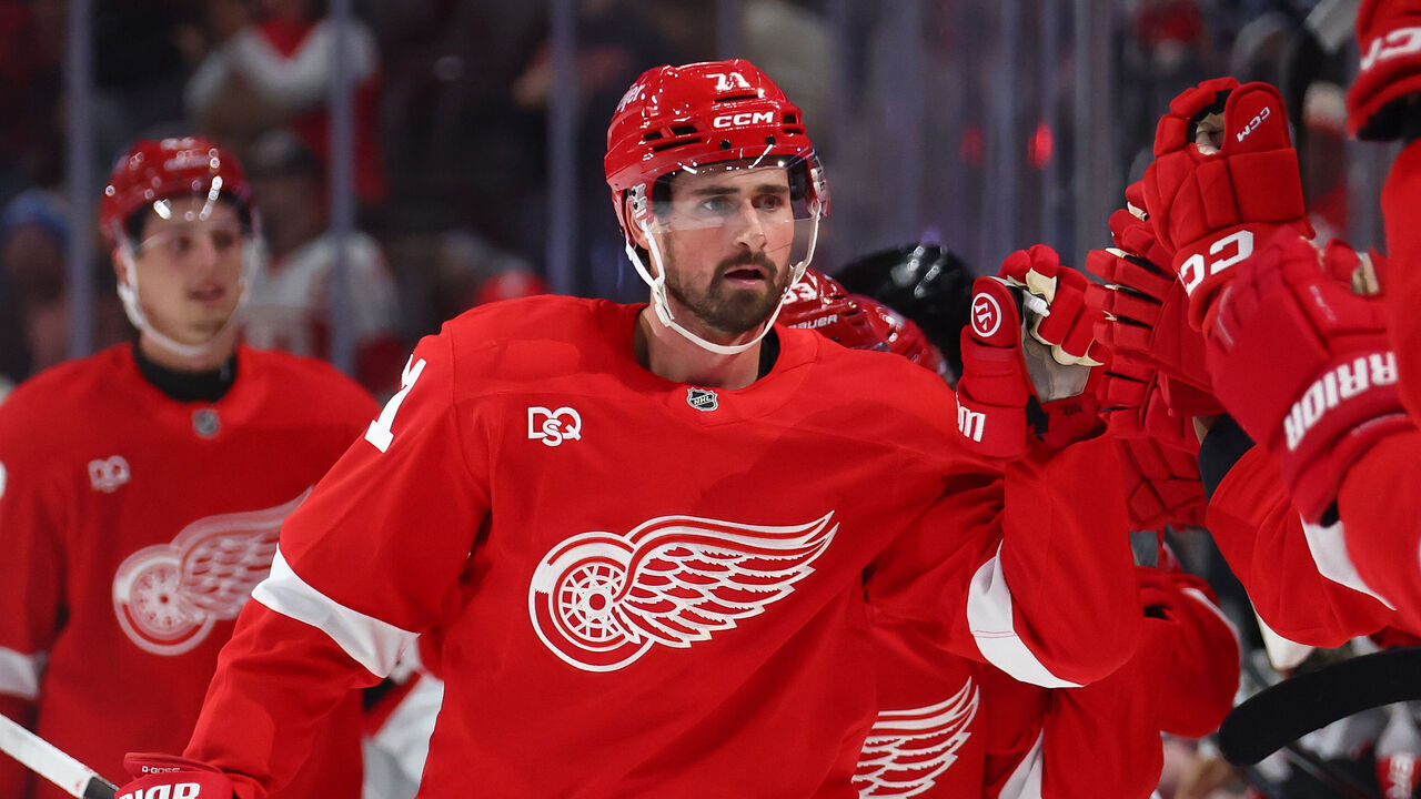 DETROIT, MICHIGAN - OCTOBER 06: Dylan Larkin #71 of the Detroit Red Wings celebrates his first period goal with teammates while playing the Ottawa Senators at Little Caesars Arena on October 06, 2026 in Detroit, Michigan.
