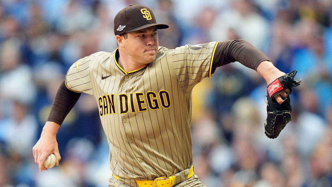 MILWAUKEE, WISCONSIN - OCTOBER 04: Mason Miller #22 of the San Diego Padres delivers the pitch against the Milwaukee Brewers during the eighth inning in game two of the National League Division Series at American Family Field on October 04, 2026 in Milwaukee, Wisconsin.
