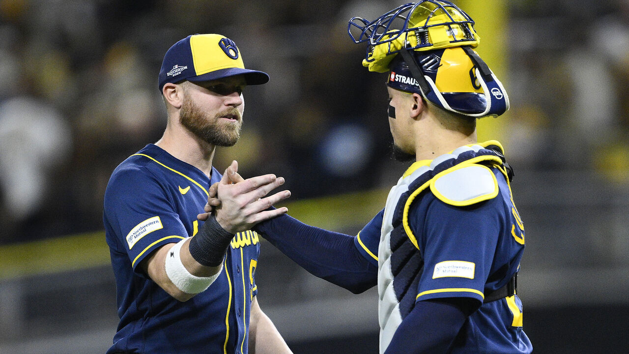 SAN DIEGO, CALIFORNIA - OCTOBER 07: Jake Bauers #9 and William Contreras #24 of the Milwaukee Brewers celebrate the 3-1 win against the San Diego Padres in game four of the National League Division Series at Petco Park on October 07, 2026 in San Diego, California.