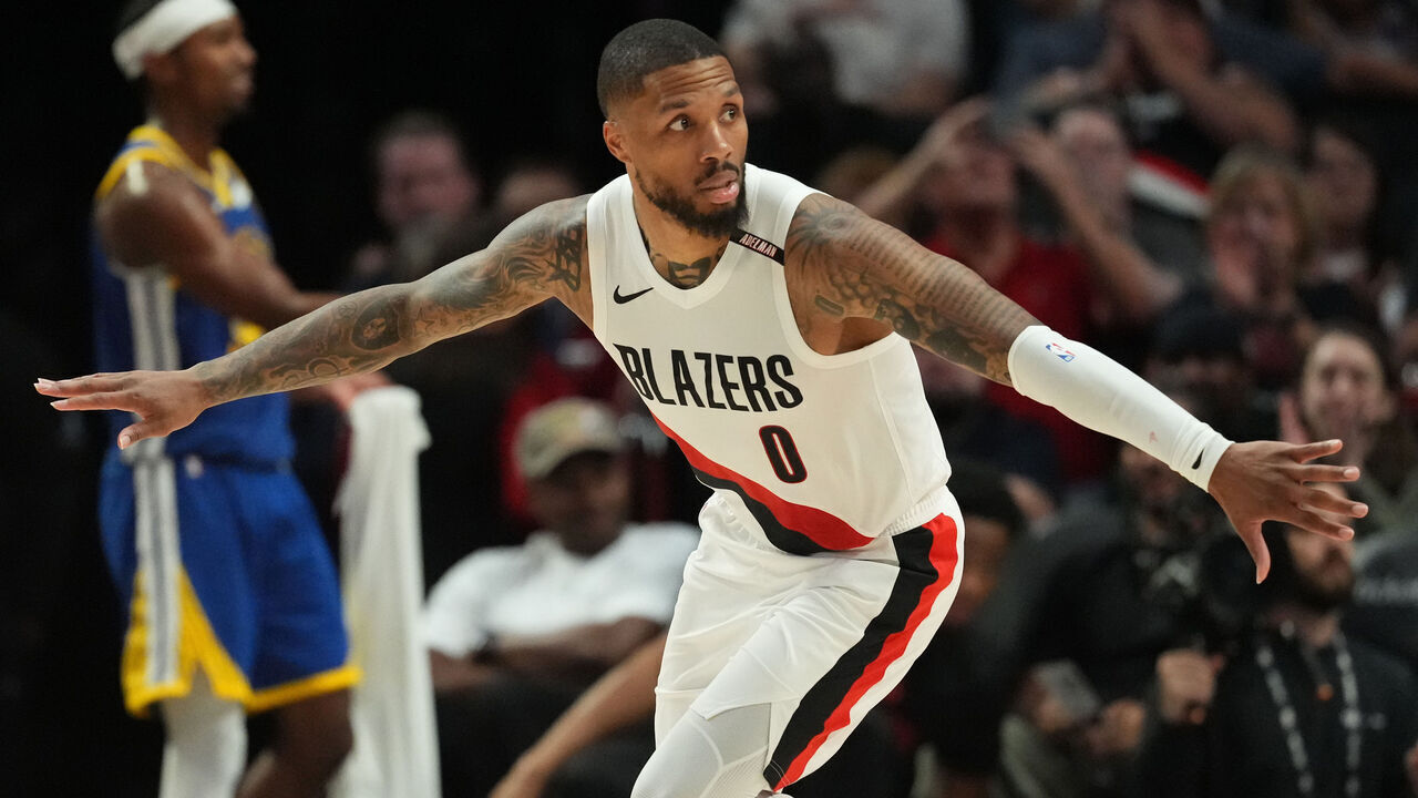 PORTLAND, OREGON - OCTOBER 07: Damian Lillard #0 of the Portland Trail Blazers reacts after scoring a basket during the first half of the preseason game against the Golden State Warriors at Moda Center on October 07, 2026 in Portland, Oregon.