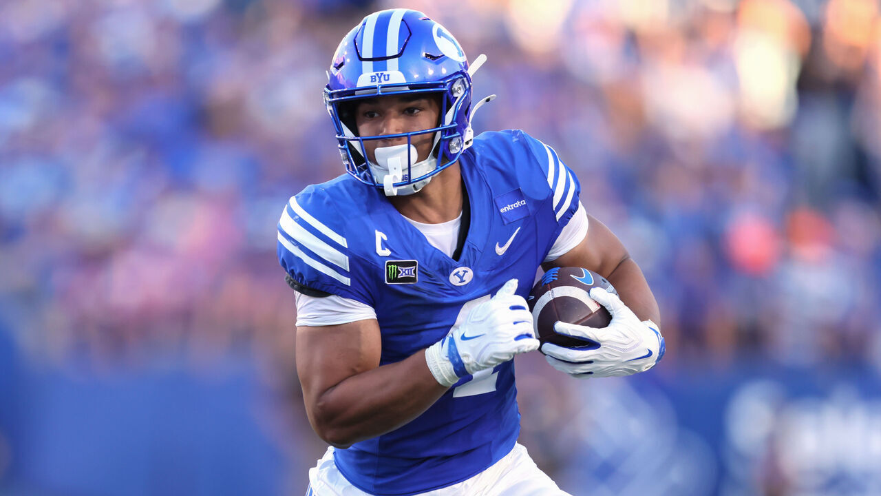 PROVO, UTAH - SEPTEMBER 5: LJ Martin #4 of the Brigham Young Cougars runs the ball against the Utah Tech Trailblazers during the first half of their game at LaVell Edwards Stadium on September 5, 2026 in Provo, Utah.