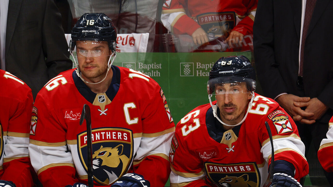 SUNRISE, FL - APRIL 26: Aleksander Barkov #16 and Brad Marchand #63 of the Florida Panthers look on against the Tampa Bay Lightning in the third period of Game Three of the First Round of the 2025 NHL Stanley Cup Playoffs at the Amerant Bank Arena on April 26, 2025 in Sunrise, Florida.