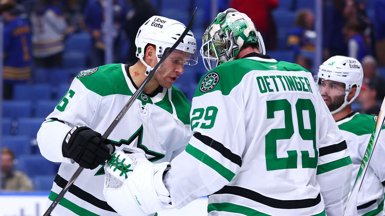 BUFFALO, NEW YORK - OCTOBER 08: Jake Oettinger #29 of the Dallas Stars is congratulated by Mikko Rantanen #96 following their 4-0 shutout against the Buffalo Sabres during an NHL game at KeyBank Center on October 08, 2026 in Buffalo, New York.