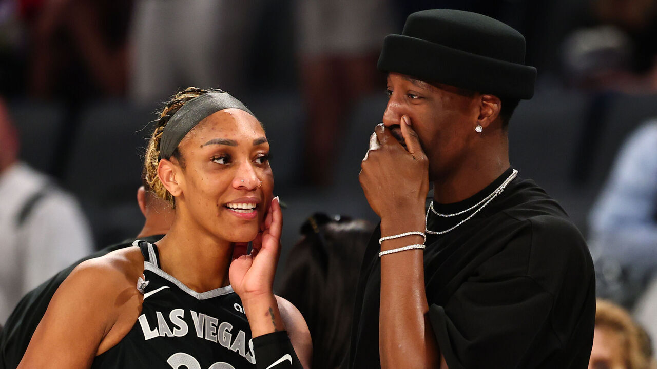 LAS VEGAS, NV - MAY 23: A'ja Wilson #22 of the Las Vegas Aces and Bam Adebayo talk after the game against the Los Angeles Sparks on May 23, 2026 at Michelob ULTRA Arena in Las Vegas, Nevada. Mandatory Copyright Notice: Copyright 2026 NBAE