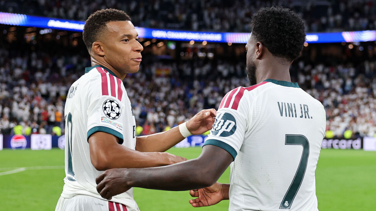 MADRID, SPAIN - SEPTEMBER 08: Kylian Mbappe of Real Madridinteracts with his teammate Vinicius Junior after the UEFA Champions League 2026/27 League Phase MD1 match between Real Madrid C.F. and FC Internazionale Milano at Estadio Santiago Bernabeu on September 08, 2026 in Madrid, Spain.