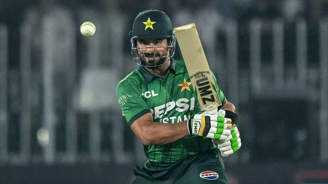 Pakistan's captain Sahibzada Farhan watches the ball after playing a shot during the first T20 international cricket match between Pakistan and Sri Lanka at the Rawalpindi Cricket Stadium in Rawalpindi on October 9, 2026.