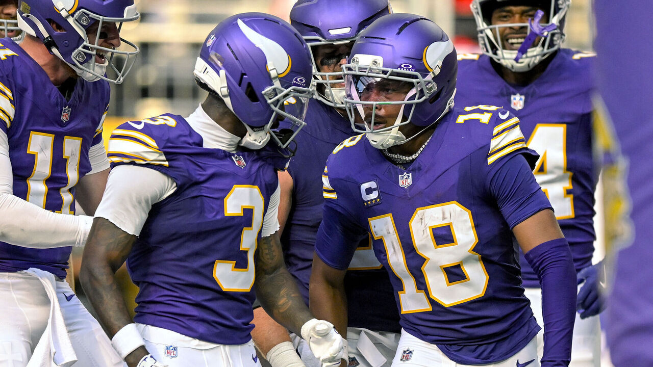 MINNEAPOLIS, MN - SEPTEMBER 13: Minnesota Vikings wide receiver Justin Jefferson (18) celebrates his 38-yard touchdown reception with Minnesota Vikings quarterback Carson Wentz (11) and Minnesota Vikings wide receiver Jordan Addison (3) during the second quarter of a NFL game between the Minnesota Vikings and Green Bay Packers on September 13, 2026, at U.S. Bank Stadium in Minneapolis MN.