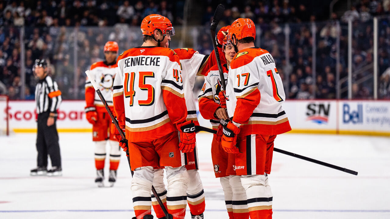 WINNIPEG, CANADA - OCTOBER 9: Mikael Granlund #64 of the Anaheim Ducks celebrates his goal with teammates in the third period against the Winnipeg Jets at Canada Life Centre on October 9, 2026 in Winnipeg, Canada.