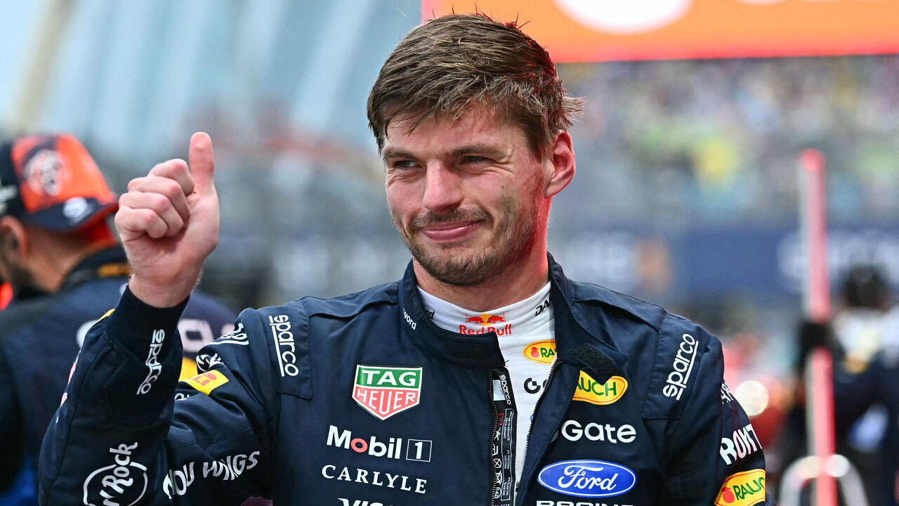 Red Bull Racing's Dutch driver Max Verstappen celebrates winning the sprint race ahead of the Formula One Singapore Grand Prix at the Marina Bay Street Circuit in Singapore on October 10, 2026.