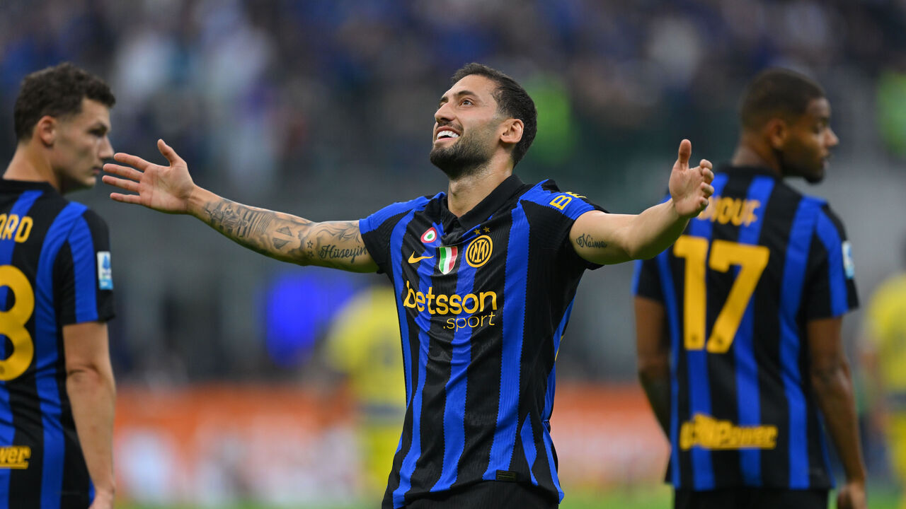 MILAN, ITALY - OCTOBER 10: Hakan Calhanoglu of FC Internazionale celebrates after scoring his team's second goal during the Serie A match between FC Internazionale and Parma Calcio at Stadio Giuseppe Meazza on October 10, 2026 in Milan, Italy.