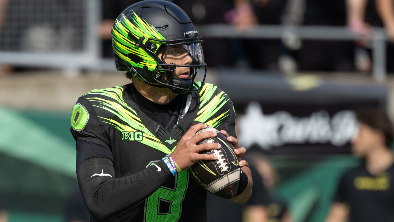 EUGENE, OREGON - OCTOBER 10: Dylan Raiola #8 of the Oregon Ducks rolls out to pass against the UCLA Bruins in the first quarter UCLA Bruins at Autzen Stadium on October 10, 2026 in Eugene, Oregon.