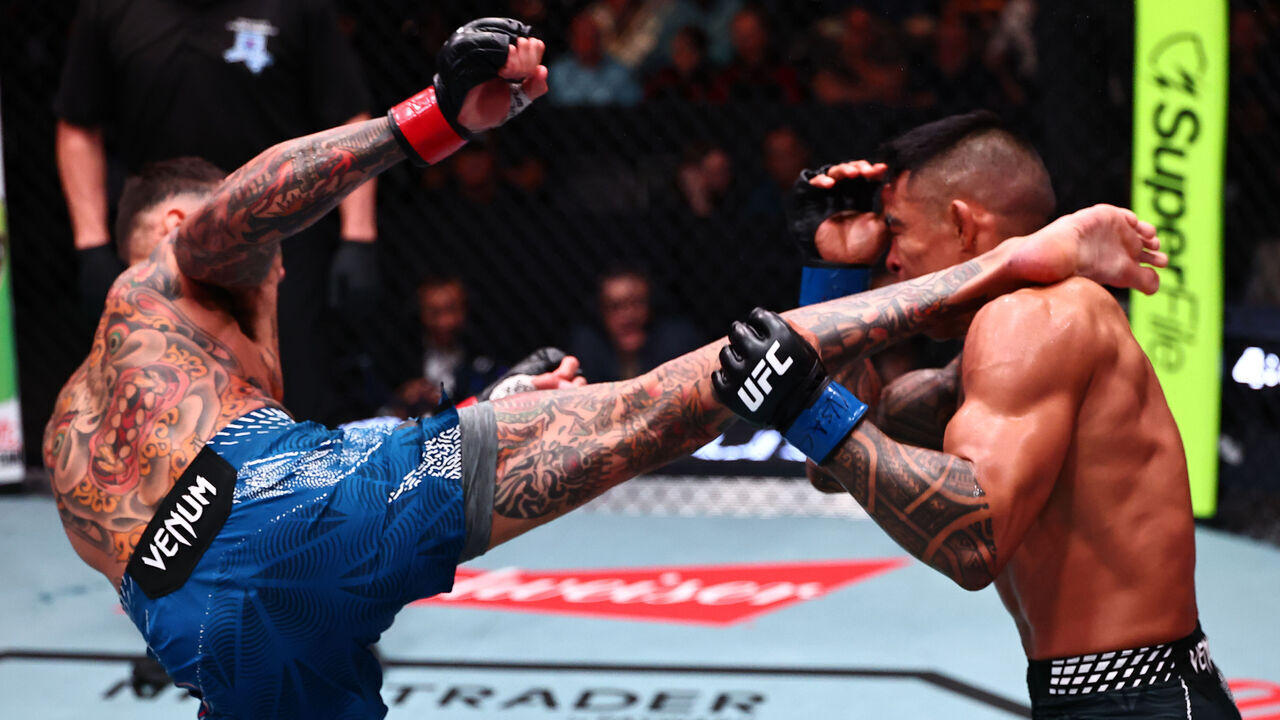 LAS VEGAS, NEVADA - OCTOBER 10: Andre Fili kicks Kai Kamaka III in a featherweight fight during the UFC Fight Night event at Meta APEX on October 10, 2026 in Las Vegas, Nevada.