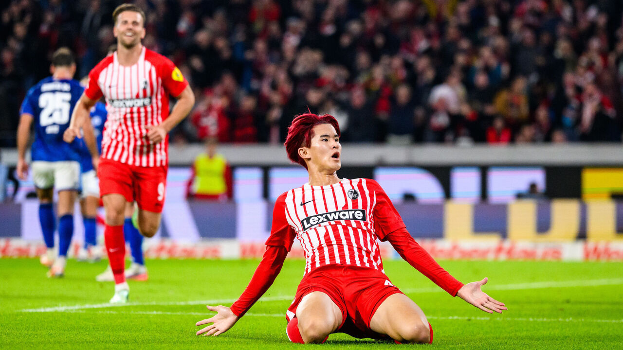 11 October 2026, Baden-Württemberg, Freiburg im Breisgau: Soccer, Men: Bundesliga, SC Freiburg vs. FC Schalke 04, Matchday 5, Europa-Park Stadium; Keisuke Goto (SC Freiburg) celebrates after scoring the goal that made it 2-1. Photo: Tom Weller/dpa - IMPORTANT NOTICE: In accordance with the regulations of the Bundesliga and the DFB (German Football Association), it is prohibited to use or allow the use of photographs taken in the stadium and/or during the game in the form of sequential images and/or video-like photo series.