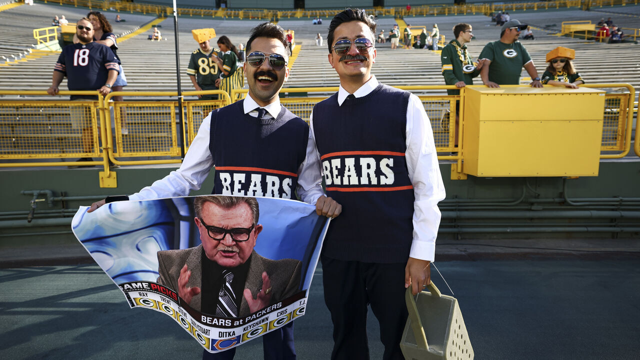 GREEN BAY, WISCONSIN - OCTOBER 11: Chicago Bears fans honor the late Mike Ditka, a former NFL player, head coach, and commentator prior to an NFL football game between the Green Bay Packers and the Chicago Bears at Lambeau Field on October 11, 2026 in Green Bay, Wisconsin.