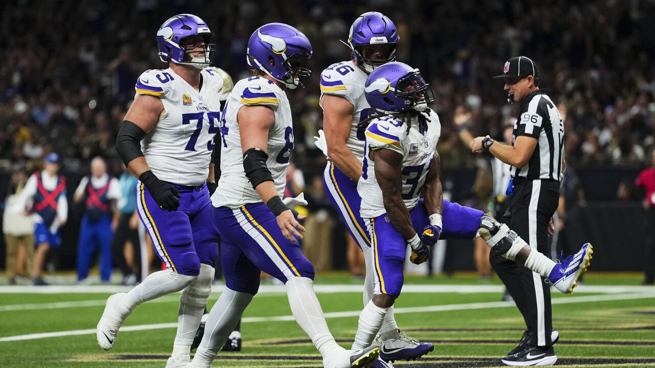 NEW ORLEANS, LA - OCTOBER 11: Aaron Jones Sr. #33 of the Minnesota Vikings celebrates after scoring a touchdown against the New Orleans Saints during an NFL football game at Cesars Superdome on October 11, 2026 in New Orleans, Louisiana.