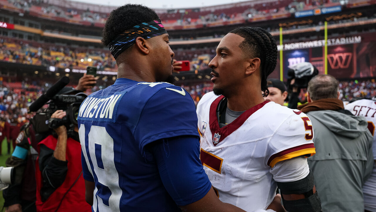 LANDOVER, MARYLAND - OCTOBER 11: Jameis Winston #19 of the New York Giants and Jayden Daniels #5 of the Washington Commanders interact on the field after the NFL game at Northwest Stadium on October 11, 2026 in Landover, Maryland.