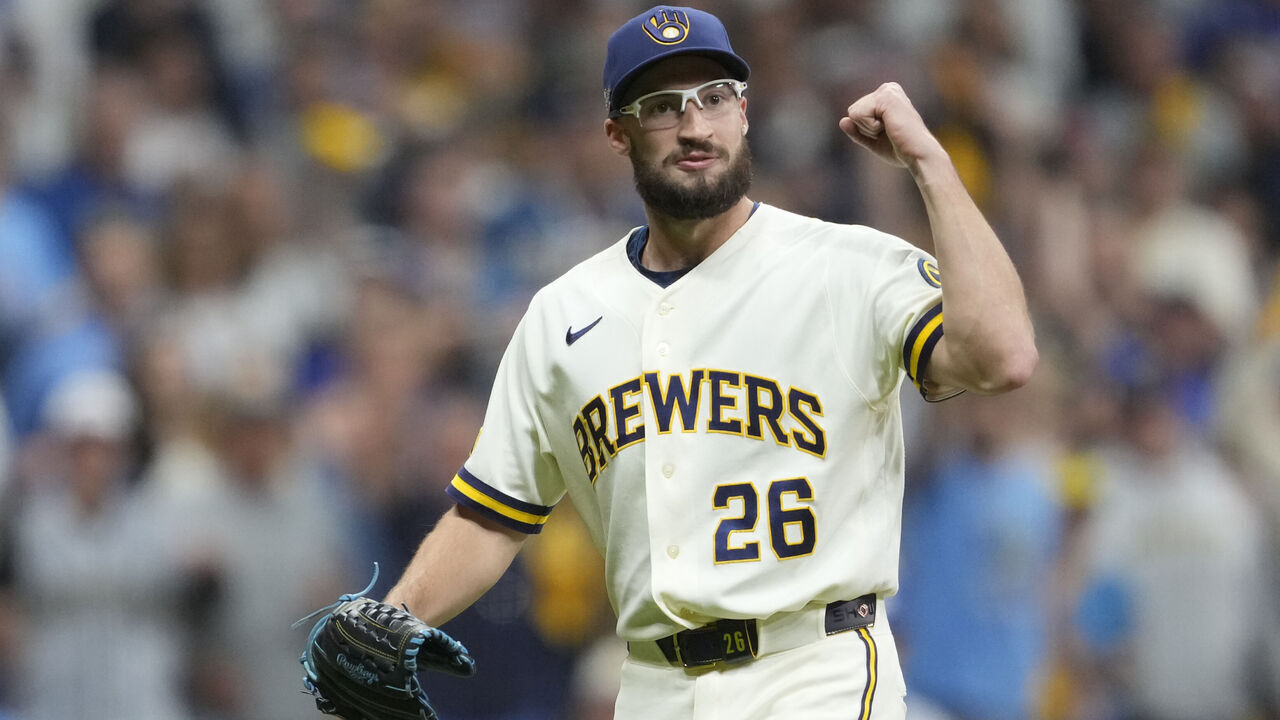 MILWAUKEE, WISCONSIN - OCTOBER 11: Aaron Ashby #26 of the Milwaukee Brewers reacts against the Los Angeles Dodgers during the eighth inning in game one of the National League Championship Series at American Family Field on October 11, 2026 in Milwaukee, Wisconsin.