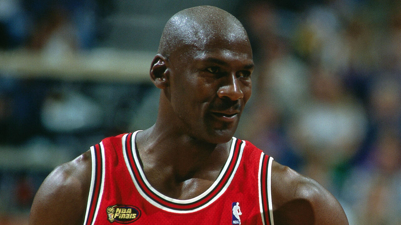 SALT LAKE CITY - JUNE 14: Michael Jordan #23 and Ron Harper #9 of the Chicago Bulls look on during game six of the 1998 NBA Finals against the Utah Jazz on June 14, 1998 in Salt Lake City, Utah. NOTE TO USER: User expressly acknowledges and agrees that, by downloading and/or using this photograph, user is consenting to the terms and conditions of the Getty Images License Agreement. Mandatory Copyright Notice: Copyright 1998 NBAE