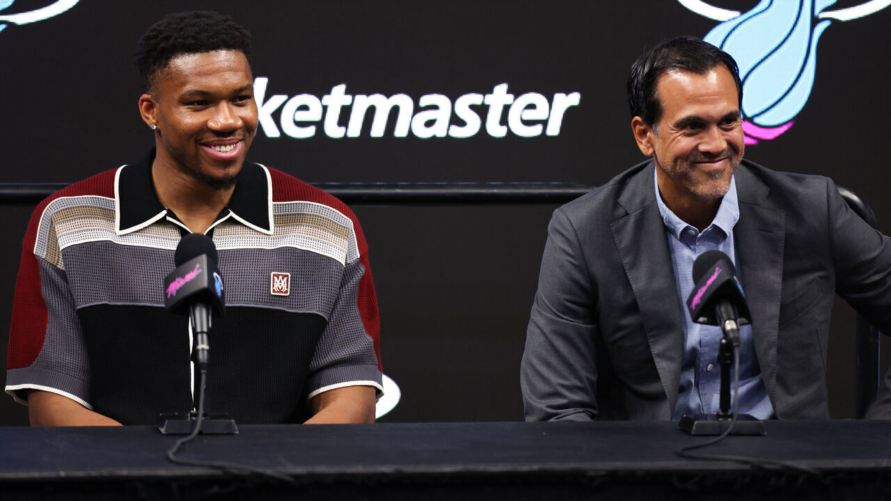 MIAMI, FLORIDA - JULY 16: Giannis Antetokounmpo #7 and head coach Erik Spoelstra of the Miami Heat speak to the media during an introductory press conference at Kaseya Center on July 16, 2026 in Miami, Florida.