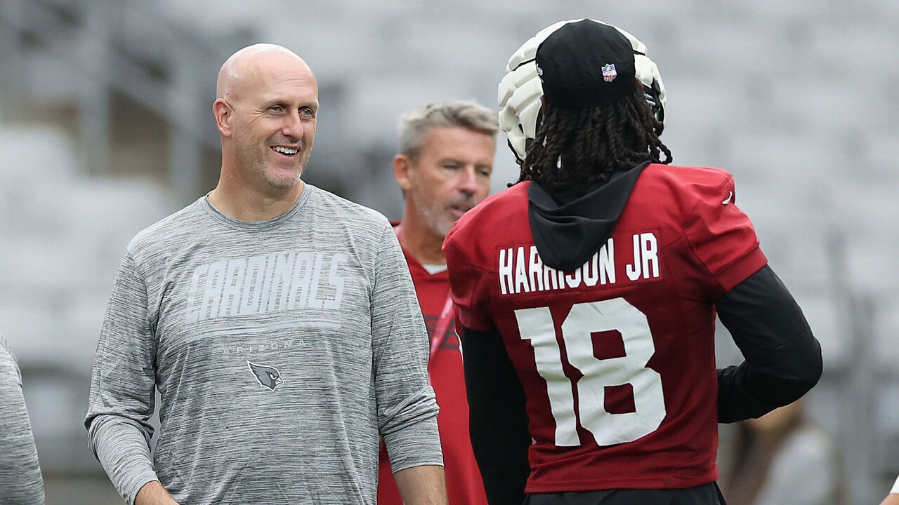 GLENDALE, ARIZONA - JULY 26: General manager Monti Ossenfort of the Arizona Cardinals talks with Marvin Harrison Jr. #18 during a team practice ahead of the NFL season at State Farm Stadium on July 26, 2026 in Glendale, Arizona.